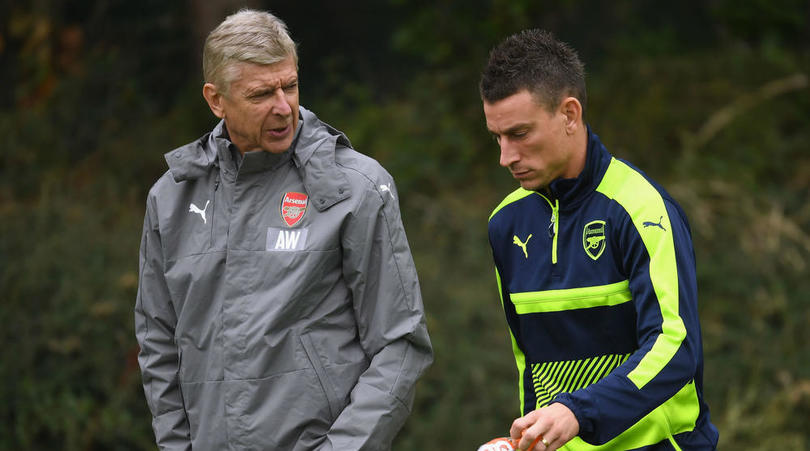 Arsene Wenger and Laurent Koscielny