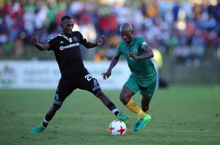 Thabo Rakhale challenges Nduduzo Sibiya during the Nedbank Cup semi-final