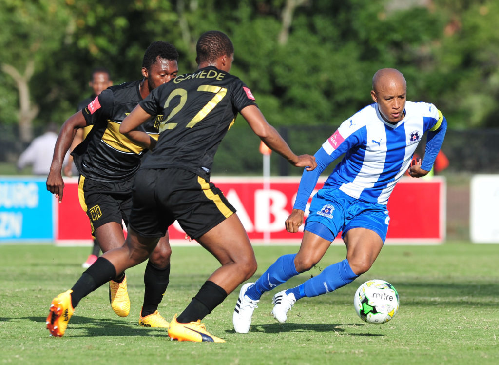 Kurt Lentjies challenged by Tshepo Gumede in the Absa Premiership