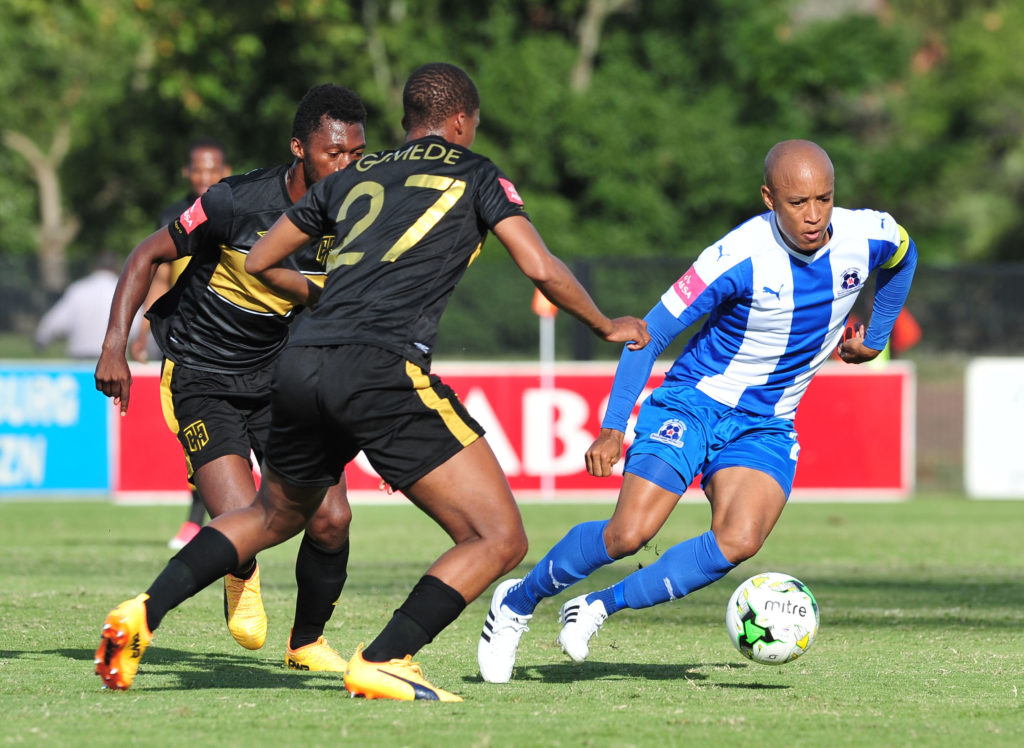 Kurt Lentjies challenged by Tshepo Gumede in the Absa Premiership