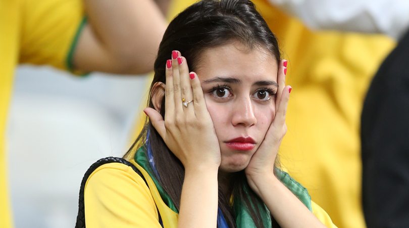 Brazil fan dejected after their World Cup defeat to Germany