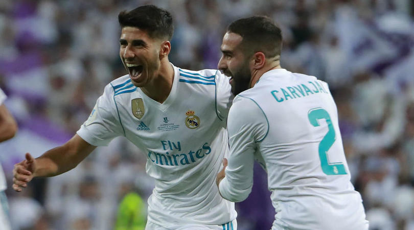 Marco Asensio celebrating with Dani Carvajal