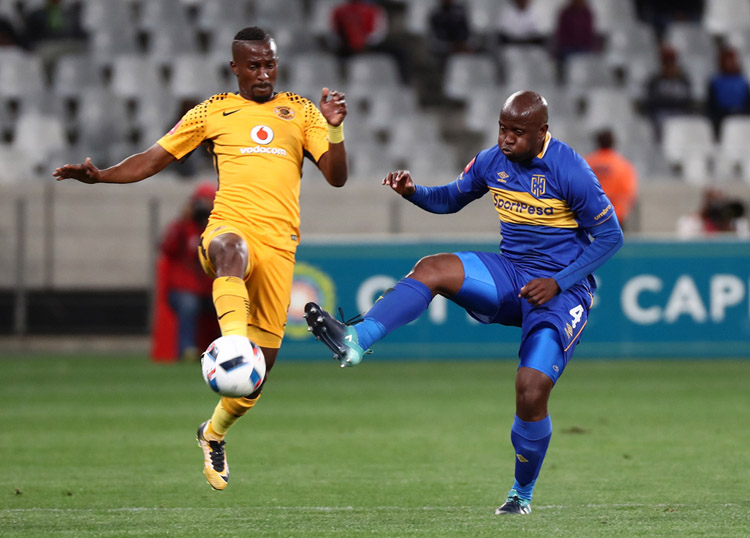 Bhongolwethu Jayiya battles for the ball with Vincent Kobola