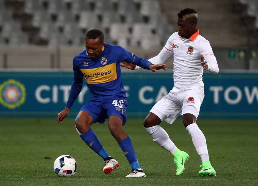 Lehlohonolo Majoro evades challenge from Walter Musona