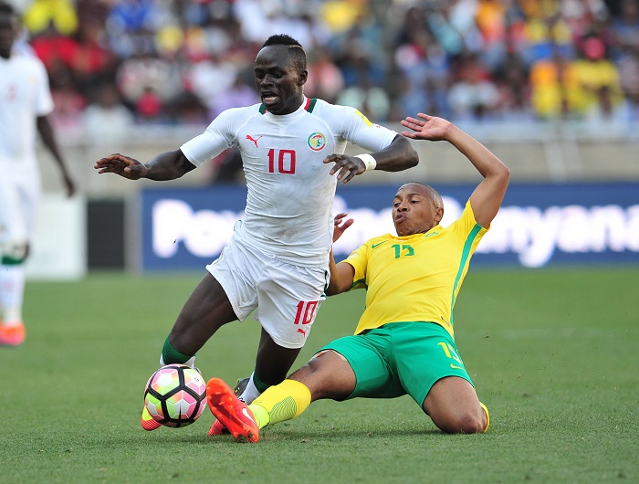 Sadio Mane tackled by Andile Jali