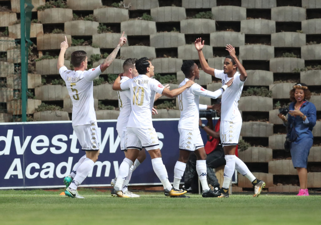 Gerald Phiri celebrates his goal with teammates