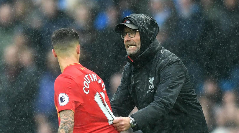 Philippe Coutinho and Jurgen Klopp