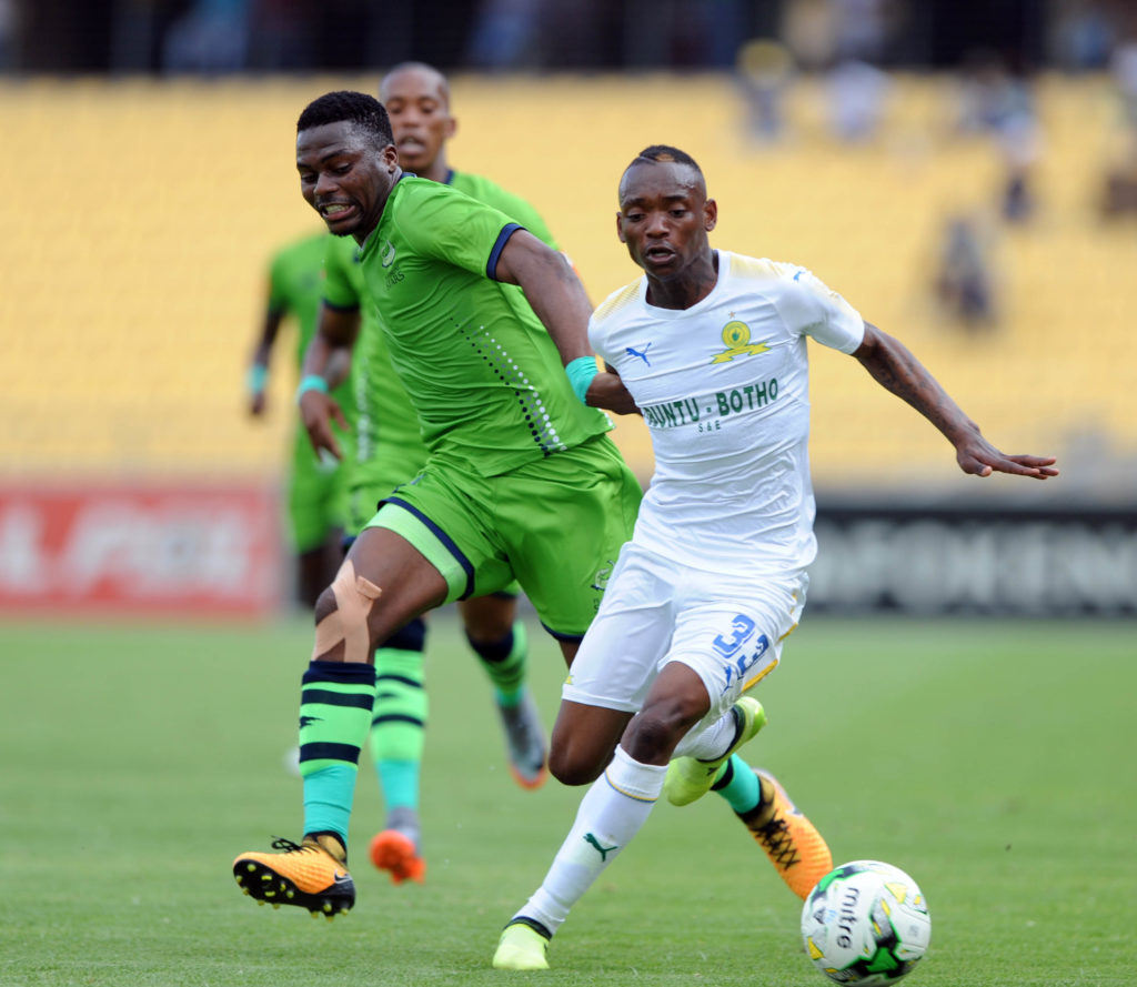 Enocent Mkhabela challenges Khama Billiat for the ball