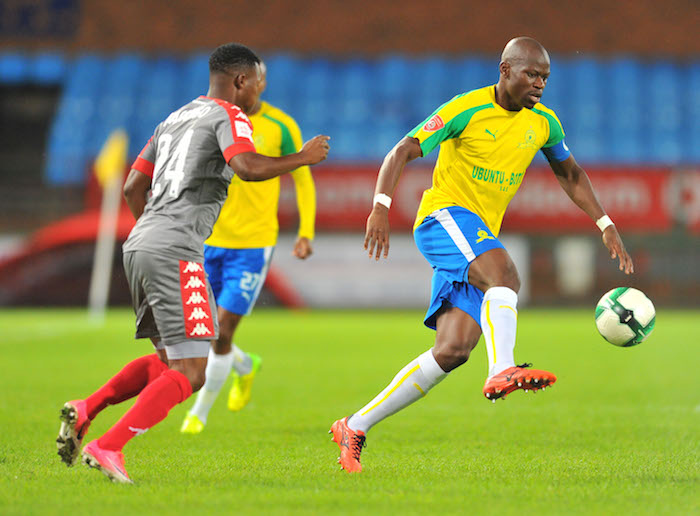 Hlompho Kekana of tackled by Mandla Masango