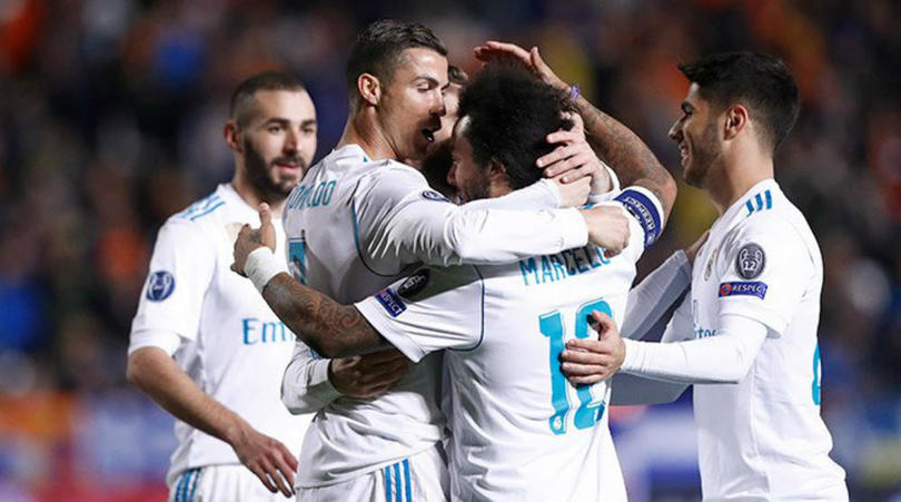 Record-breaking Ronaldo sends Real through in style