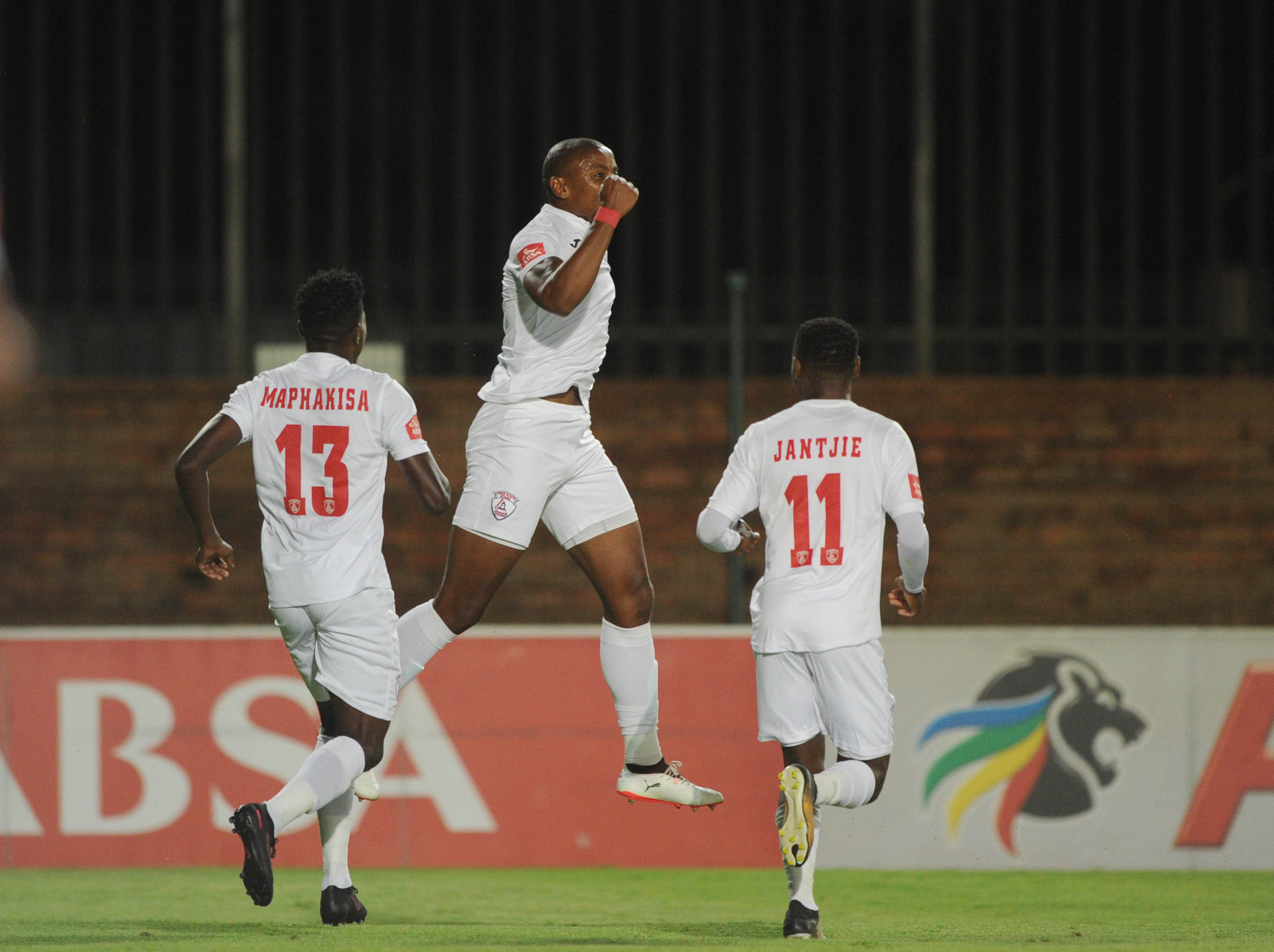 Tamsanqa Teyise celebrates his goal with teammates