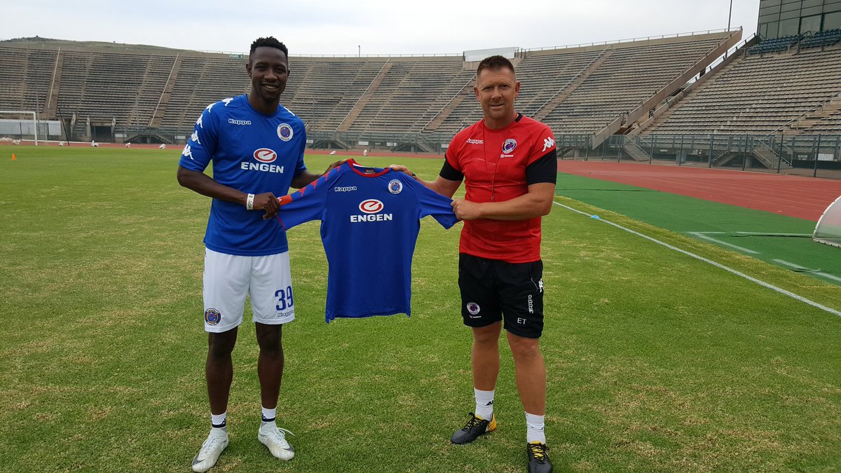 Evans Rusike with Eric Tinkler