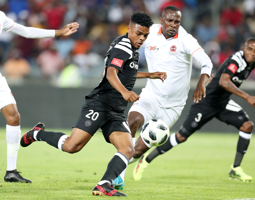 Lyle Foster scores goal while challenged by Thapelo Tshilo