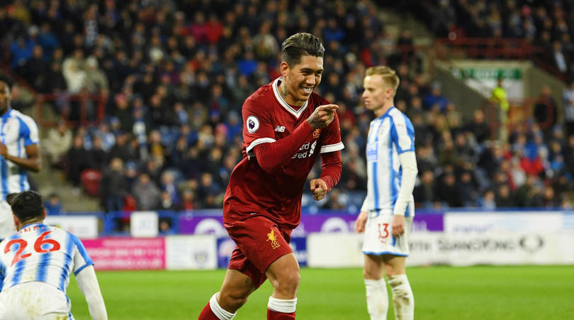 Roberto Firmino celebrates his goal against Huddersfield Town