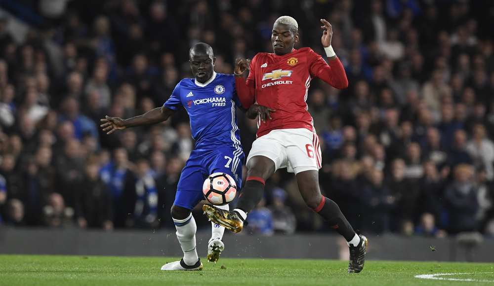 N'Golo Kante of Chelsea vies for the ball against Paul Pogba of Manchester United.