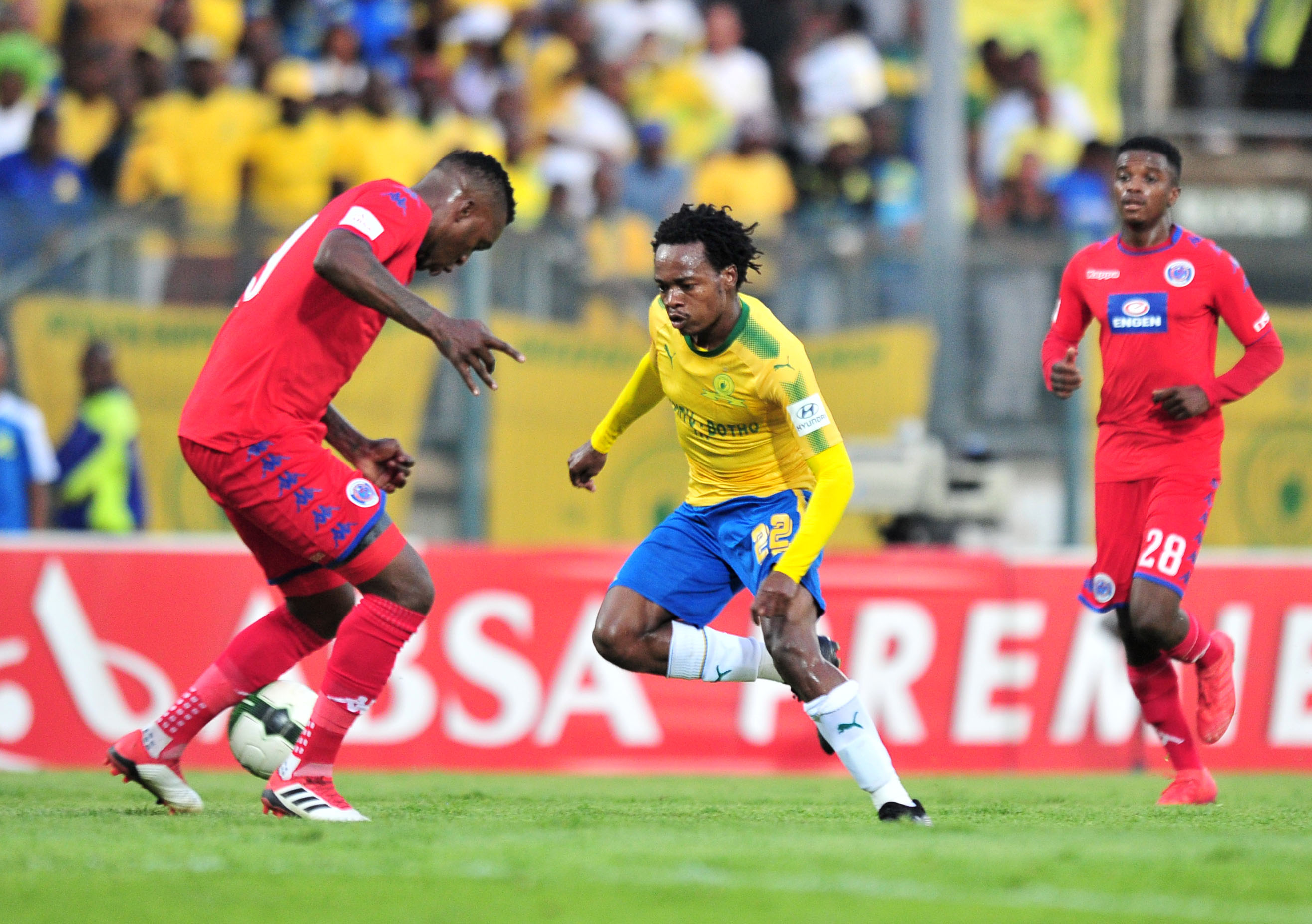 Percy Tau challenged by Morgan Gould