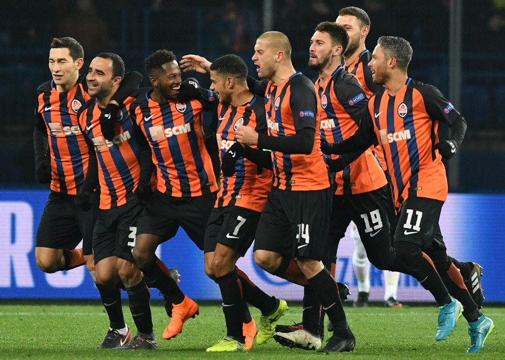 Fred celebrates with teammates after hitting the winner