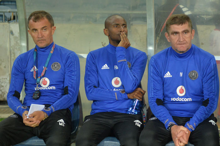 Rhulani Mokoena and the rest of the Orlando Pirates coaches.