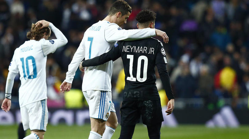 Cristiano Ronaldo and Neymar embrace at half time