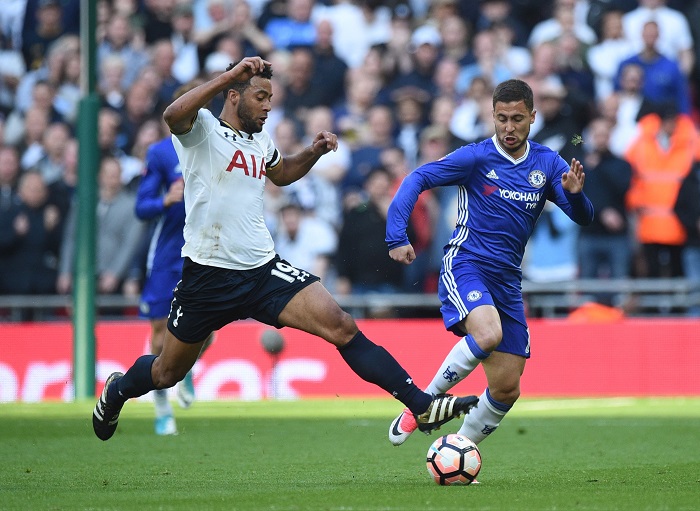 Chelsea's Eden Hazard vies for the ball against Tottenham's Mousa Dembele.