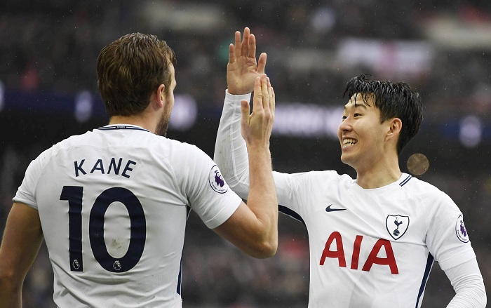 Tottenham Hotspur's Harry Kane with teammate Son Heung-min.