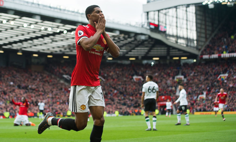 Marcus Rashford celebrates scoring the second goal against Liverpool