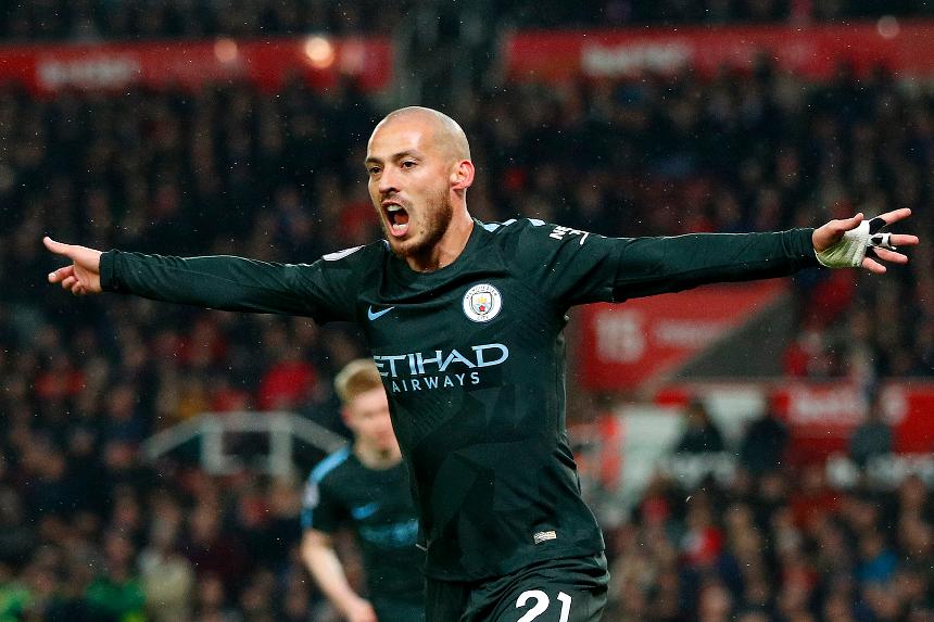 David Silva celebrates his goal against Stoke