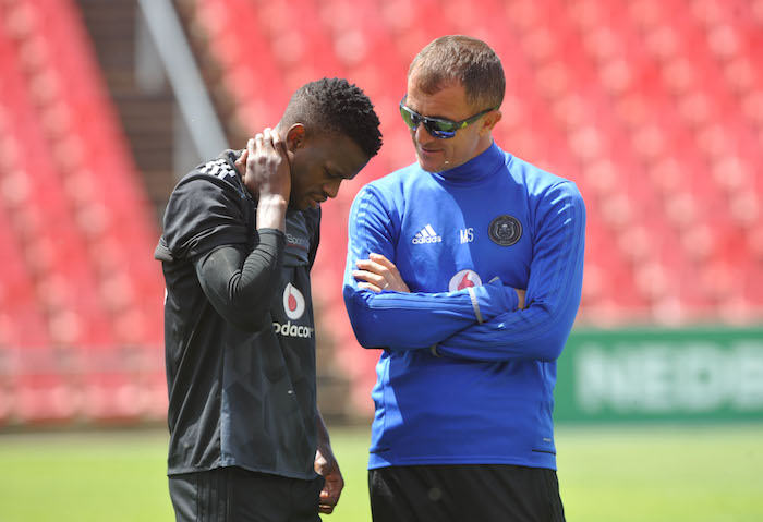 Innocent Maela of Orlando Pirates with head coach Milutin Sredojevic