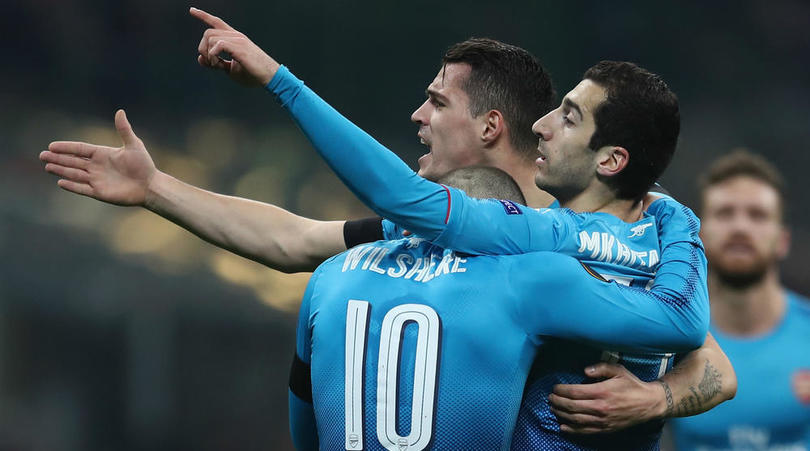 Henrikh Mkhitaryan celebrates his goal with teammates