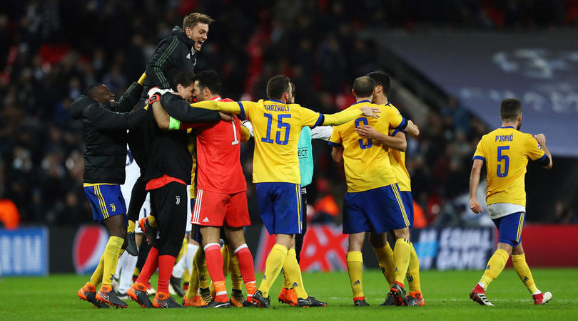 Juventus players celebrate victory over Tottenham Hotspur