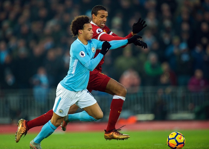 Manchester City's Leroy Sane in action against Liverpool's Joel Matip