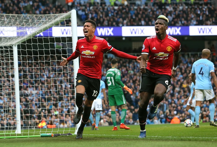 Manchester United's Chris Smalling celebrates scoring his side's third goal of the game.