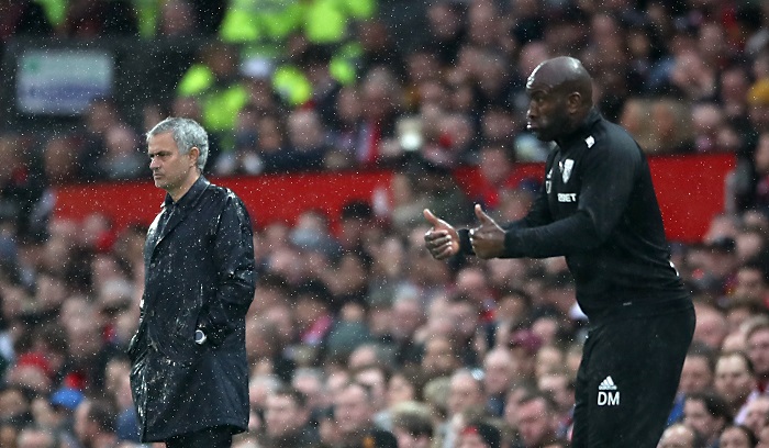 Manchester United manager Jose Mourinho and West Bromwich Albion Caretaker Manager Darren Moore.