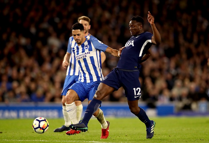 Spurs's Victor Wanyama and Brighton & Hove Albion's Beram Kayal battle for the ball.