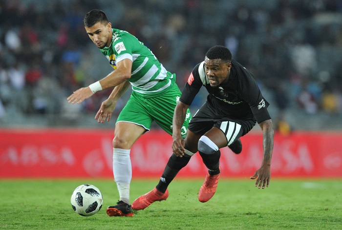 Thamsanqa Gabuza of Orlando Pirates is tackled by Lorenzo Gordinho of Bloemfontein Celtic