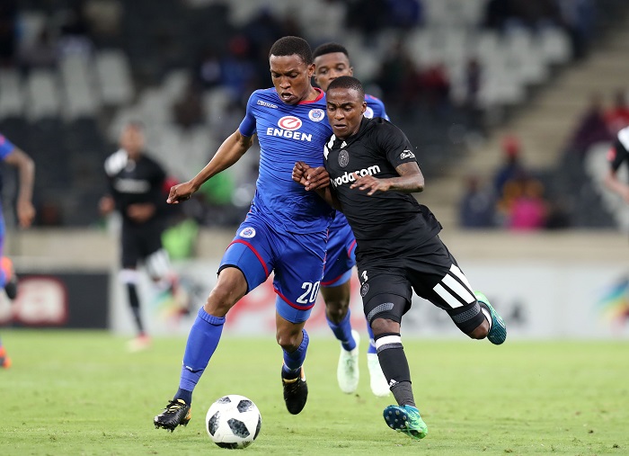 Thembinkosi Lorch of Orlando Pirates challenged by Grant Kekana of Supersport United