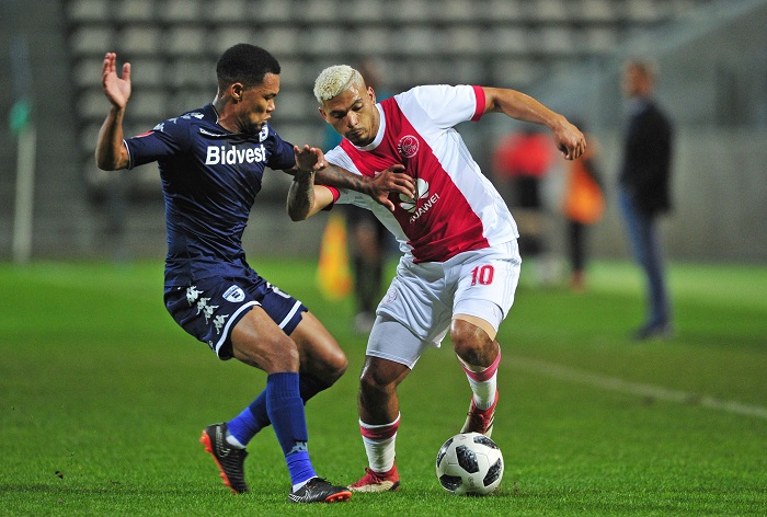 Toriq Losper of Ajax Cape Town takes on Granwald Scott of Bidvest Wits