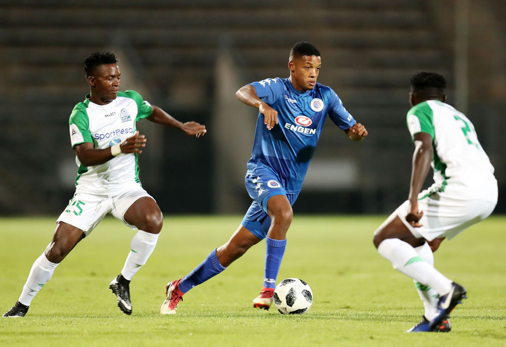 Jamie Webber challenged by Odhiambo George and Onguso Wesley