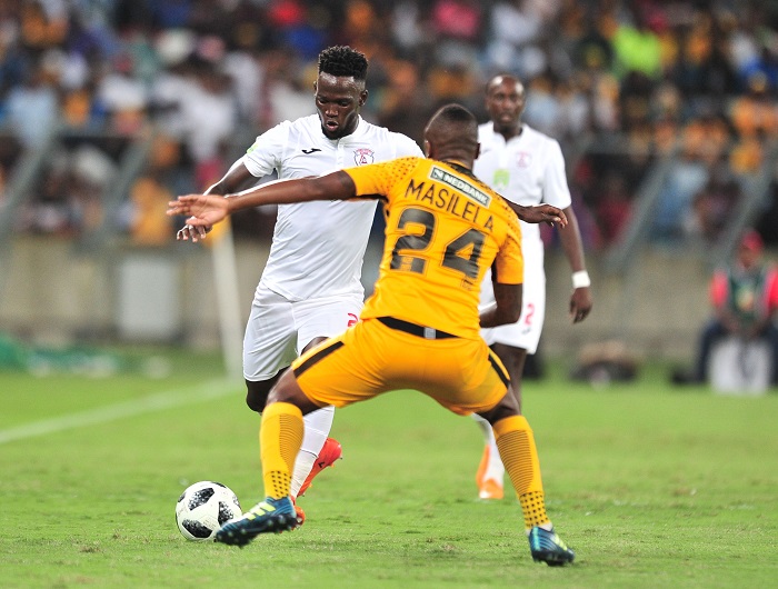 Siphelele Mthembu of Free State Stars challenged by Tsepo Masilela of Kaizer Chiefs