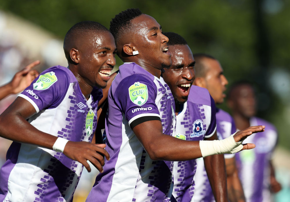 Lebohang Maboe celebrates his goal with teammates