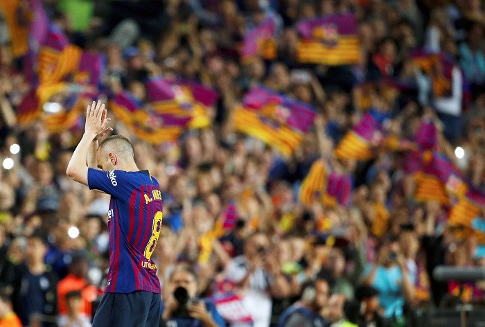 Andres Iniesta leaves the pitch in his last match for Barcelona.