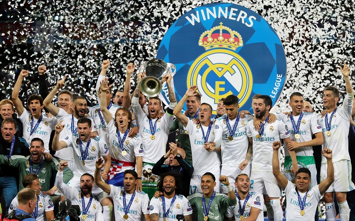 Real Madrid captain Sergio Ramos lifts the trophy after the team won the UCL final.