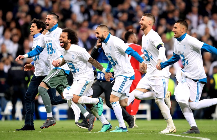 Real Madrid players celebrate at the end of the semi-final.