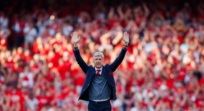 Arsenal manager Arsene Wenger salues the fans.