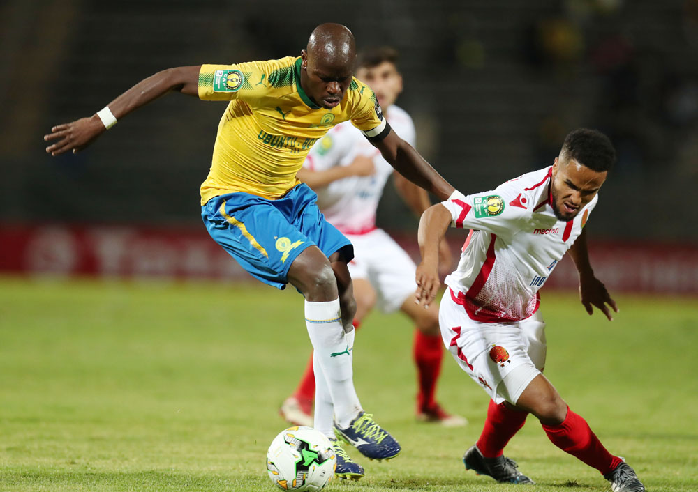 Hlompho Kekana challenged by Amin Tighazoui