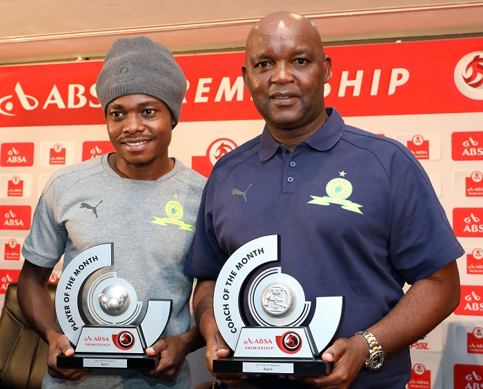 Percy Tau and Pitso Mosimane of Mamelodi Sundowns.