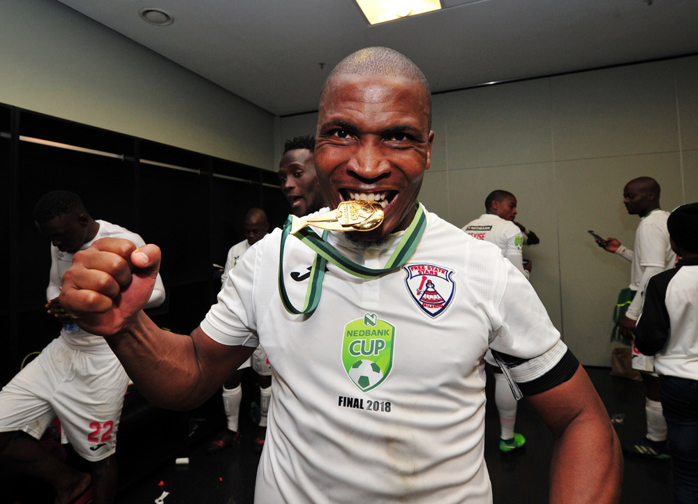 Free State Stars captain Paulus Masehe of Free State Stars with his Winners medal