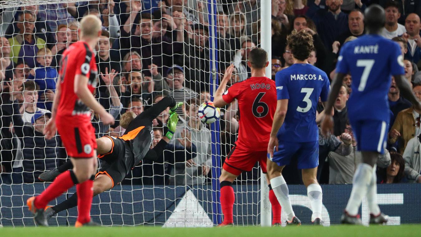 Jonas Lossl is beaten by Marcos Alonso's inadvertent header