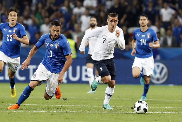 Antoine Griezmann of France in action against Danilo D'Ambrosio of Italy.