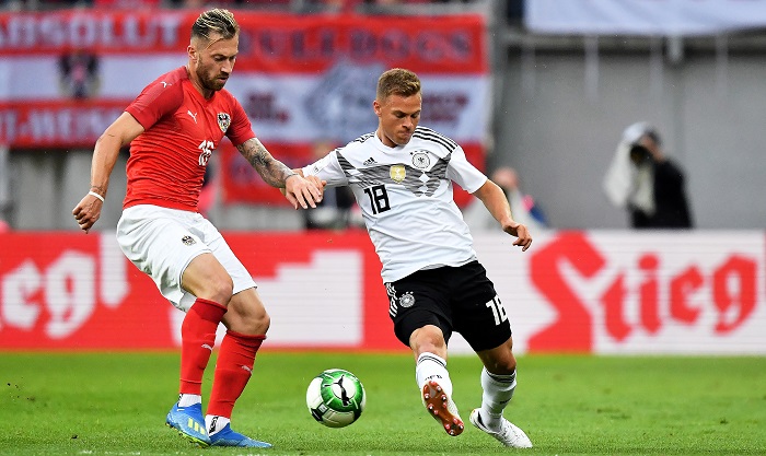 Austria's Peter Zulj in action against Joshua Kimmich of Germany